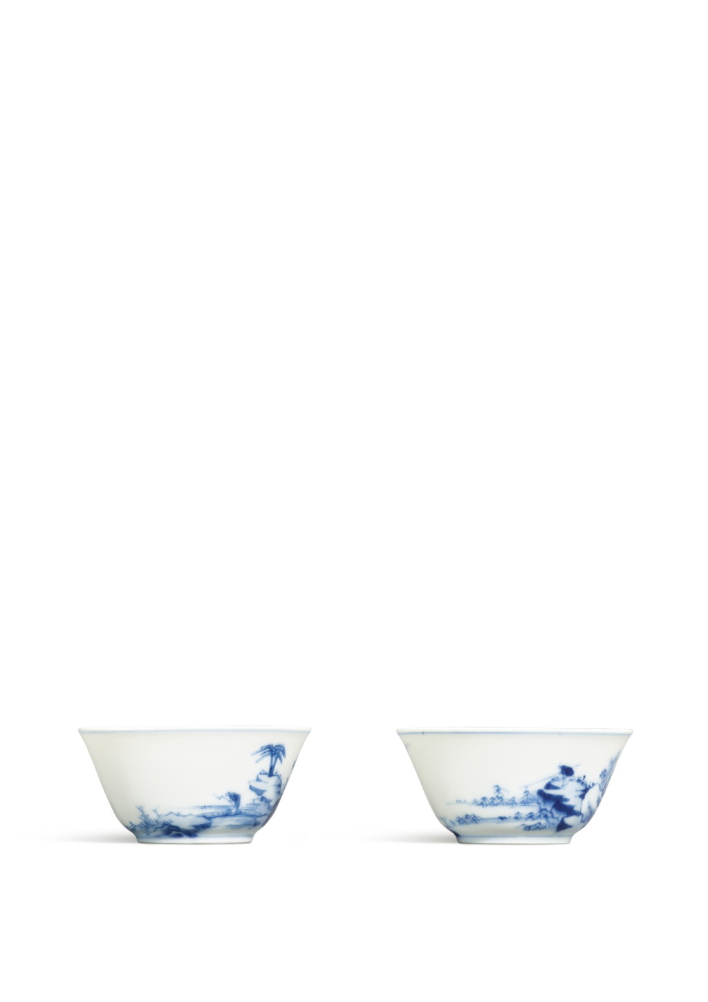 View full screen - View 1 of Lot 3631. A fine and very rare pair of blue and white 'fishermen' cups, Marks and period of Yongzheng | 清雍正 青花山水獨釣圖盃一對 《大清雍正年製》款.