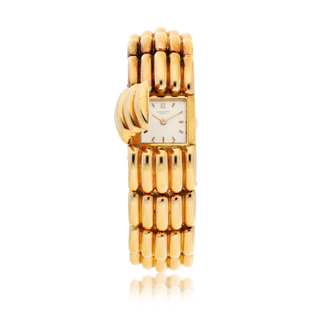 View full screen - View 1 of Lot 9359. Patek Philippe | Reference 3285/21, A pink gold watch with concealed dial and associated bracelet, Made in 1965 | 百達翡麗 | 型號3285/21 粉紅金鏈帶腕錶,備隱藏式錶盤,1965年製.