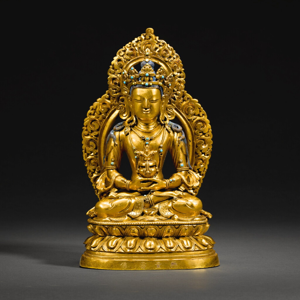 View full screen - View 1 of Lot 162. A GILT-BRONZE FIGURE OF AMITAYUS, QING DYNASTY, QIANLONG PERIOD | 清乾隆 鎏金銅無量壽佛坐像 《無量壽佛》款.