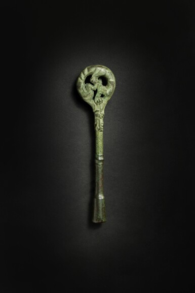 View full screen - View 1 of Lot 165. An archaic bronze ‘dragon’ zither tuning key, Eastern Zhou dynasty, Warring States period.