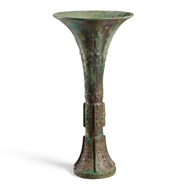 View full screen - View 1 of Lot 58. AN ARCHAIC BRONZE WINE VESSEL, GU LATE SHANG DYNASTY, 12TH – 11TH CENTURY BC | 商末公元前十二至十一世紀 青銅獸面紋出戟亞牛丁觚 《亞牛丁觚》銘.