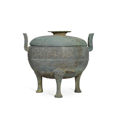 View full screen - View 1 of Lot 405. An archaic bronze ritual food vessel and cover (Ding), Eastern Zhou dynasty, Warring States period | 東周 戰國 青銅交龍紋三足蓋鼎.