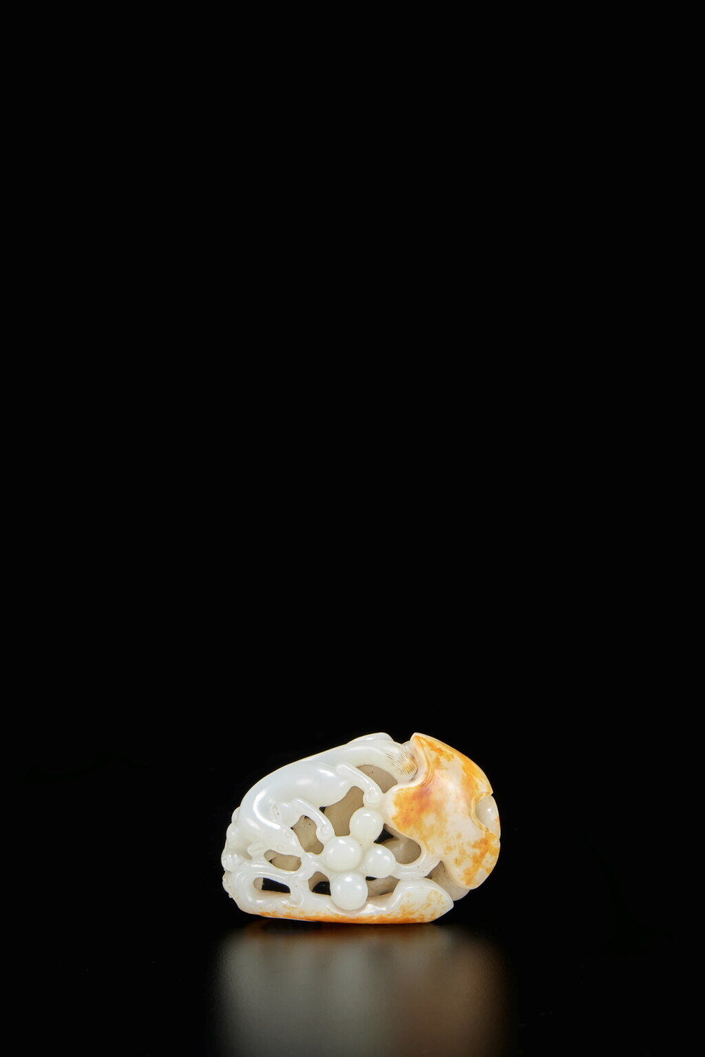 View full screen - View 1 of Lot 382. A white and russet jade 'squirrel and vine' group, Qing dynasty, Qianlong period.