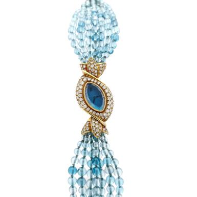 View full screen - View 1 of Lot 95. A yellow gold and diamond-set watch with blue topaz beads bracelet, Circa 1995 .