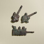 Three archaic bronze 'musicians' belt hooks, Eastern Zhou dynasty, Warring States period | 東周戰國 青銅樂師帶鉤三件