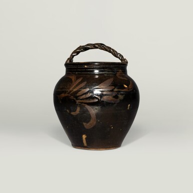 View full screen - View 1 of Lot 140. A rare 'Cizhou' russet-painted black-glazed handled jar, Jin dynasty .