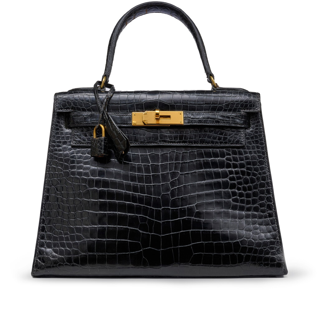 View full screen - View 1 of Lot 110. Vintage Black Shiny Porosus Crocodile Kelly 28 Sellier Gold Hardware, circa 1960-1970.