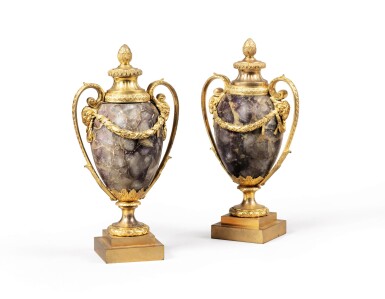 View full screen - View 1 of Lot 225. A pair of gilt-bronze-mounted blue-john candle-vases, in the manner of matthew Boulton, second-half 19th century.