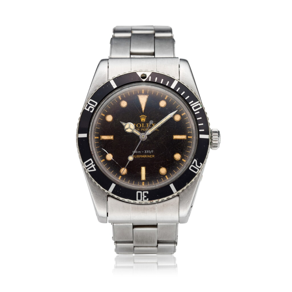 View full screen - View 1 of Lot 118. Reference 6536/1 Submariner 'Small Crown James Bond', A stainless steel automatic wristwatch with gilt dial and bracelet, Circa 1959 勞力士 6536/1 型號 Submariner 'Small Crown James Bond' 精鋼自動上鏈鍊帶腕錶備鍍金錶盤,約1959年製.