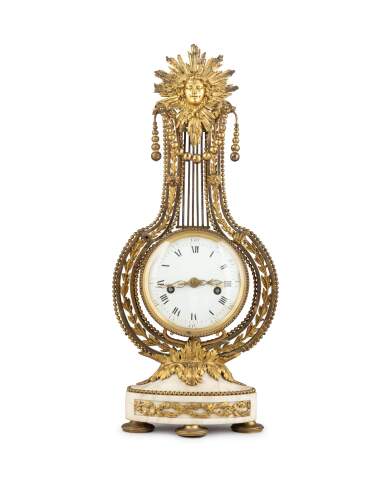 View full screen - View 1 of Lot 16. A gilt-bronze and white marble Louis XVI lyre clock, circa 1780.