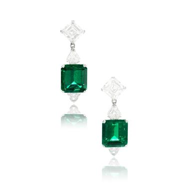 View full screen - View 1 of Lot 658. Pair of emerald and diamond pendent earrings.