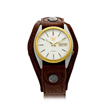 View full screen - View 1 of Lot 59. A STAINLESS STEEL AND GOLD AUTOMATIC WRISTWATCH WITH DAY AND DATE, CIRCA 1998.