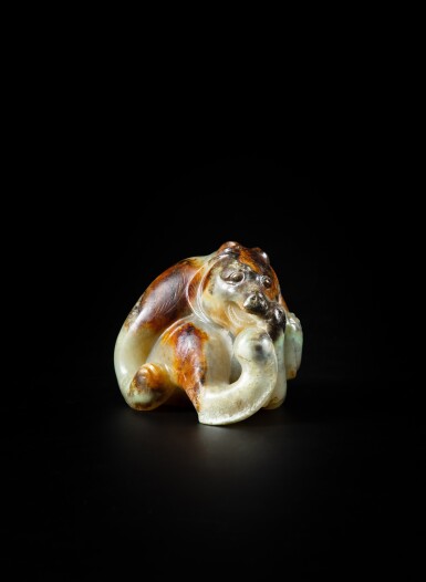 View full screen - View 1 of Lot 95. A celadon and russet brown jade ‘bear’ carving, Probably Song or Ming dynasty | 或宋至明 褐斑青玉雕熊.