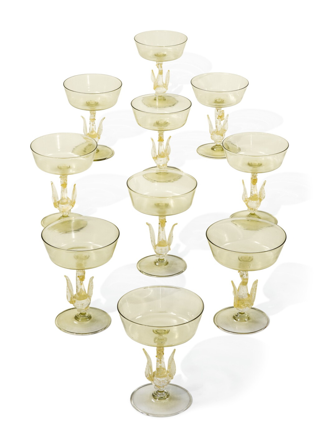 View full screen - View 1 of Lot 329. A SET OF TEN VENICE YELLOW-TINTED CHAMPAGNE OR SWEETMEAT GLASSES, LATE 19TH/ 20TH CENTURY.