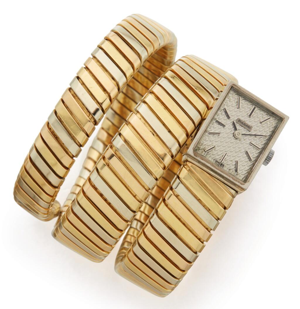 View full screen - View 1 of Lot 391. TRI-COLORED GOLD 'TUBOGAS' BRACELET-WATCH, BULGARI.