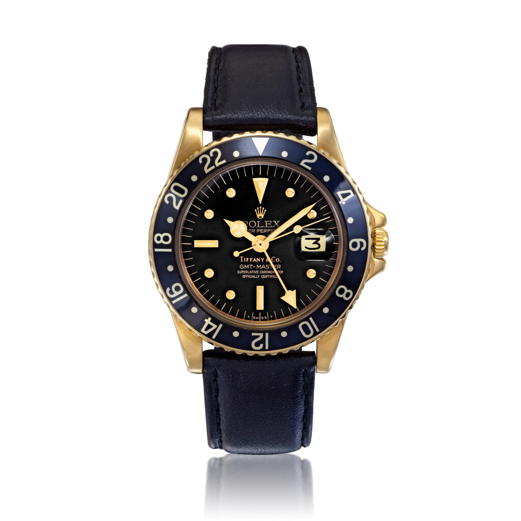 View full screen - View 1 of Lot 116. Reference 1675 GMT-Master, Retailed by Tiffany & Co.: A yellow gold automatic dual time wristwatch with date, Circa 1978 勞力士 1675 型號 GMT-Master 黃金自動上鏈兩地時間腕錶備日期顯示,約1978年製,零售商為蒂芙尼.