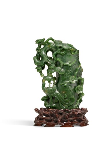 View full screen - View 1 of Lot 68. A spinach-green jade ‘phoenix’ vase, Qing dynasty, 19th century.