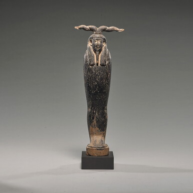 View full screen - View 1 of Lot 70. AN EGYPTIAN BITUMEN PAINTED WOOD FIGURE OF PTAH-SOKAR-OSIRIS, PTOLEMAIC PERIOD, 305-30 B.C..