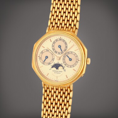 View full screen - View 1 of Lot 70. Reference 25557BA | A yellow gold perpetual calendar bracelet watch with moon phases | Circa 1981.