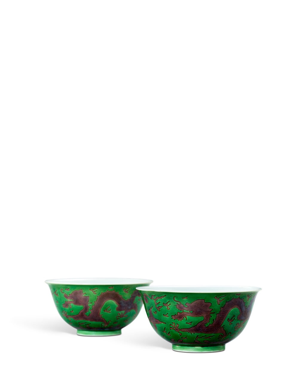 View full screen - View 1 of Lot 3639. A pair of green-ground aubergine-enamelled 'dragon' bowls, Seal marks and period of Jiaqing | 清嘉慶 綠地紫彩龍紋盌一對 《大清嘉慶年製》款.