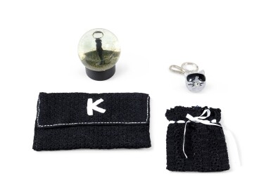 View full screen - View 1 of Lot 2200. Sephora, A snow globe with Karl Lagerfeld's silhouette | Sephora, boule à neige avec le profil de Karl Lagerfeld.