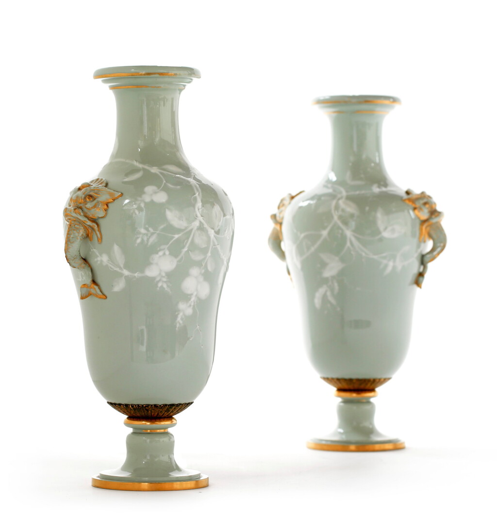 View full screen - View 1 of Lot 85. A PAIR OF SÈVRES "PÂTE-SUR-PÂTE" CELADON-GROUND PORCELAIN VASES, THE DECOR BY LEOPOLD GELY, 1855 AND 1856 | PAIRE DE VASES AUX DAUPHINS EN PORCELAINE "PÂTE-SUR-PÂTE" DE LA MANUFACTURE IMPÉRIALE DE SÈVRES, LE DÉCOR PAR LÉOPOLD GÉLY, 1855 ET 1856.