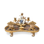 A Louis XV style gilt-bronze mounted lacquer, porcelain inkstand, 19th century, with earlier elements | Encrier en laque, porcelaine et monture de bronze doré de style Louis XV, XIXe siècle, incorporant des éléments anciens