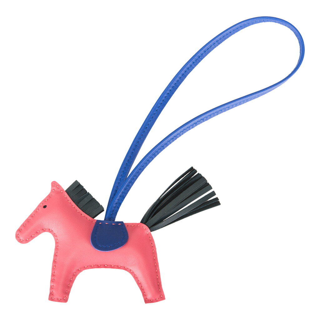 View full screen - View 1 of Lot 99. Hermès Rose Azalee/Vert Cypress/Bleu Electric Horse Rodeo Bag Charm PM.