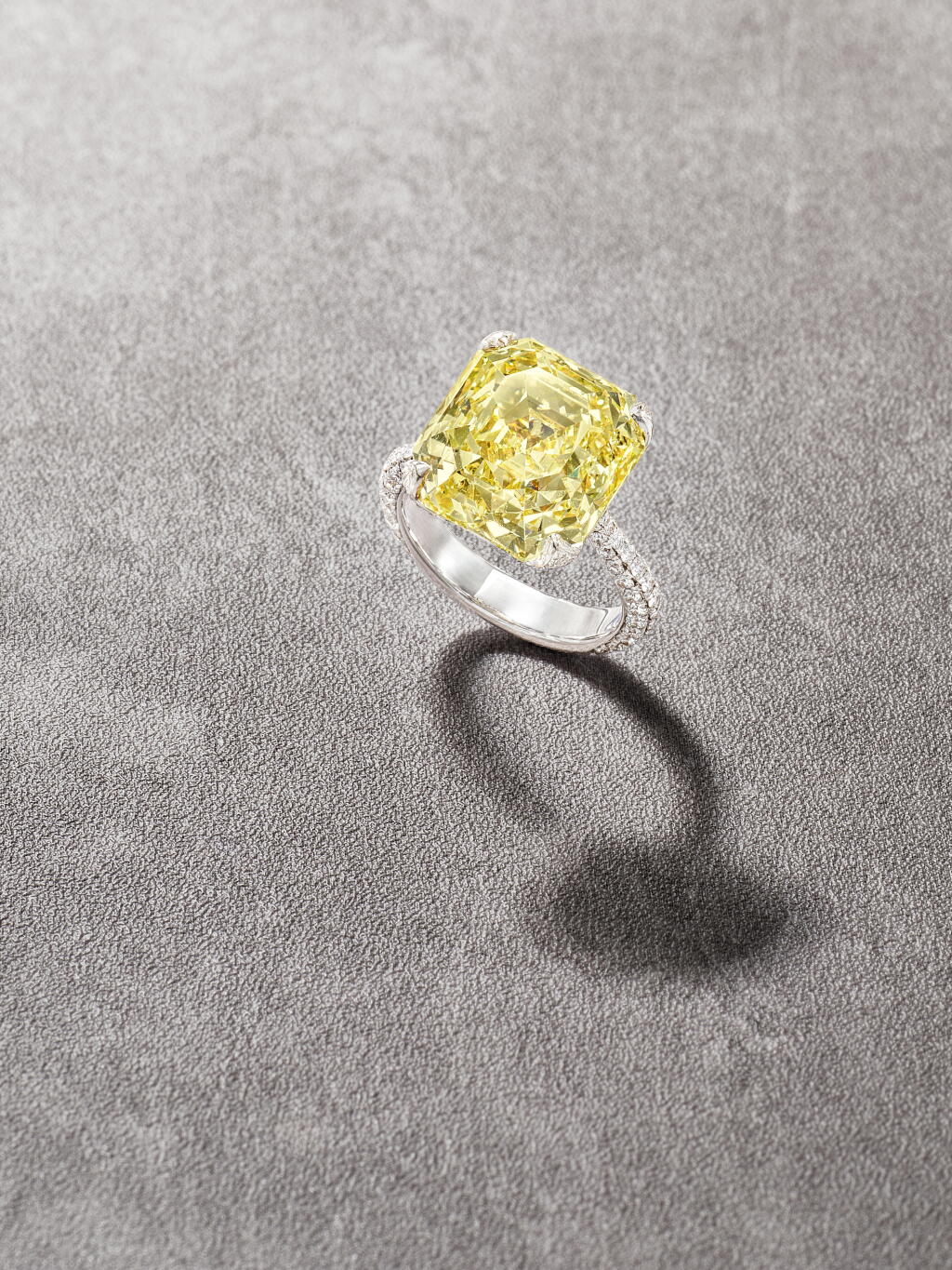 View full screen - View 1 of Lot 23. Fancy Intense Yellow Diamond and Diamond Ring.