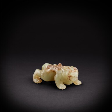View full screen - View 1 of Lot 5656. A white jade mythical beast, bixie, Han dynasty | 漢 白玉辟邪.
