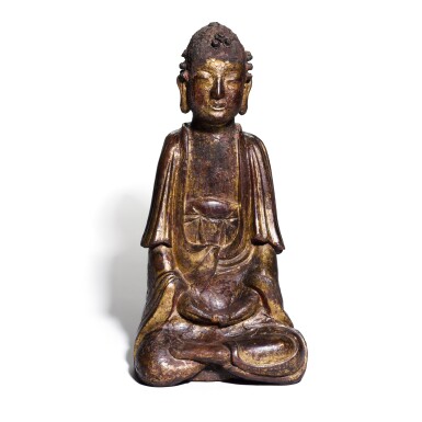 View full screen - View 1 of Lot 310. A gilt-lacquered wood seated figure of Buddha, Ming dynasty | 明 漆金木佛坐像.