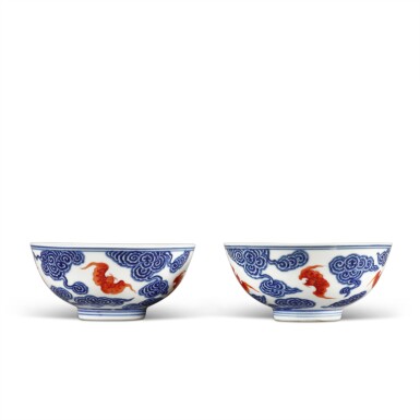 View full screen - View 1 of Lot 257. A pair of blue and white iron-red 'bats and cloud' bowls, Marks and period of Guangxu.