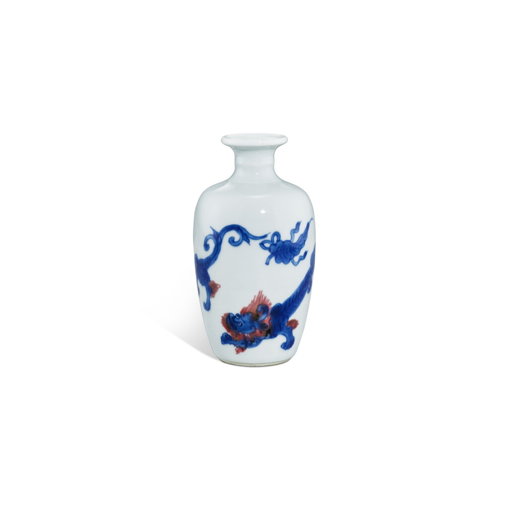 View full screen - View 1 of Lot 3332. A copper-red and underglaze-blue 'chilong' vase, Qing dynasty, Kangxi period | 清康熙 青花釉裡紅螭龍圖小瓶.