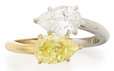 View full screen - View 1 of Lot 346. DIAMOND AND FANCY INTENSE YELLOW DIAMOND RING.