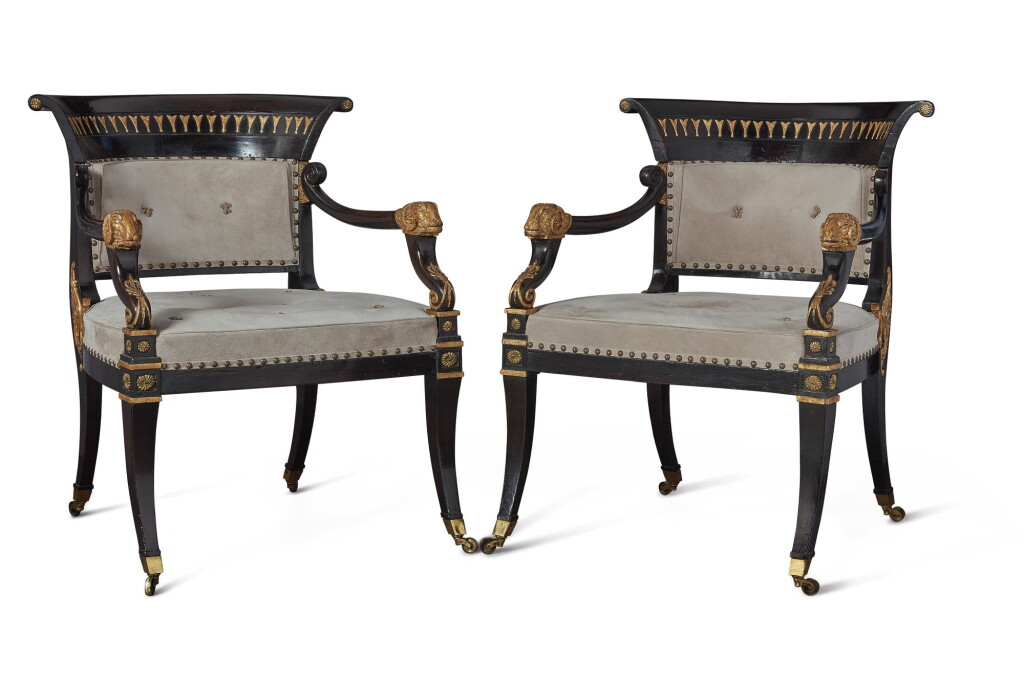View full screen - View 1 of Lot 262. A PAIR OF REGENCY EBONIZED AND PARCEL-GILT ARMCHAIRS ATTRIBUTED TO MOREL AND HUGHES, CIRCA 1815.
