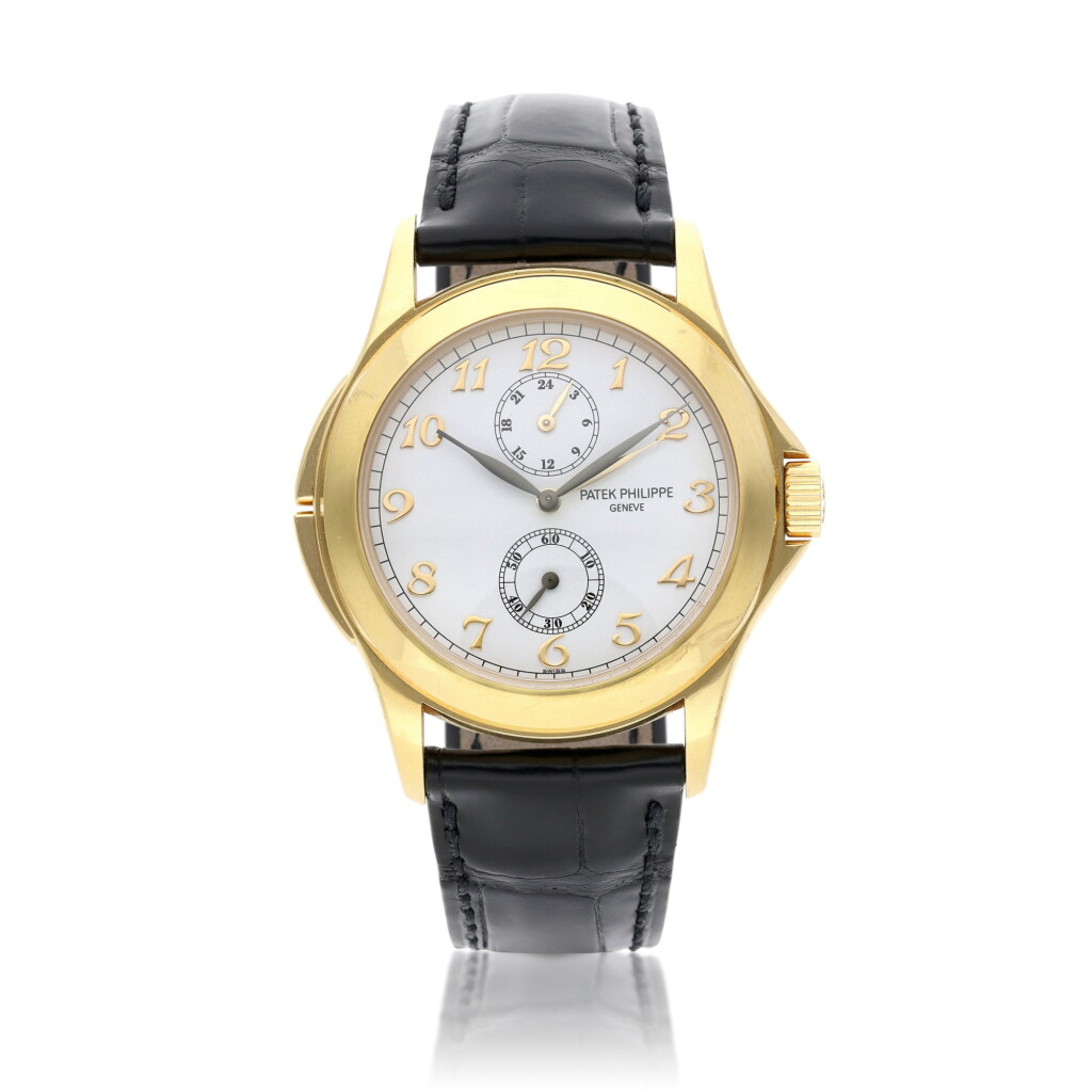 View full screen - View 1 of Lot 210. Reference 5134J-001 Travel Time | Retailed by Tiffany & Co.: A yellow gold dual time wristwatch with 24-hour indication, Circa 2005.