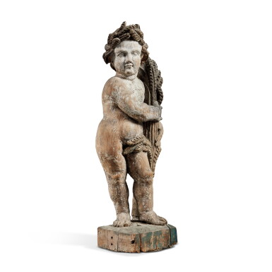 View full screen - View 1 of Lot 335. Continental White Painted and Carved Red Pine Cherub with Sheaves of Wheat, Late 18th century or Early 19th century.