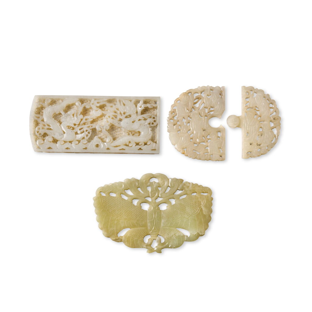 View full screen - View 1 of Lot 88. A reticulated celadon jade 'dragon' plaque, Ming dynasty .