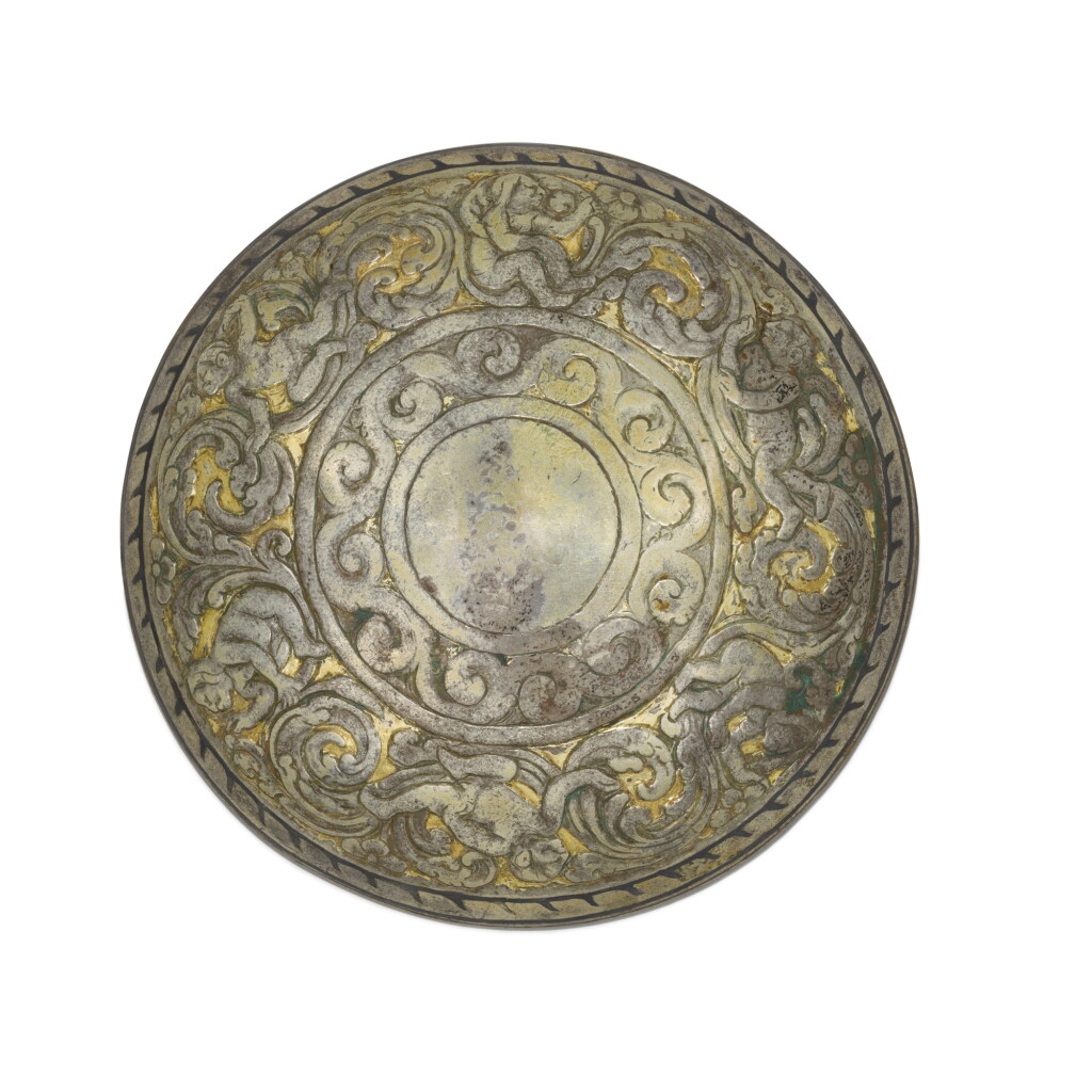 View full screen - View 1 of Lot 283. A parcel-gilt silver bowl, Northern India / Central Asia, 4th - 5th century | 北印度 / 中亞 四至五世紀 銀局部鎏金嬰戲紋盌.