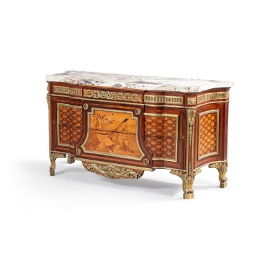 View full screen - View 1 of Lot 261. A gilt-mounted marquetry commode, Louis XVI style, late 19th century, after a model of Riesener | Importante commode en marqueterie et monture de bronze doré de style Louis XVI, fin du XIXe siècle, d'après un modèle de Riesener.