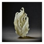 A PALE CELADON JADE CARVING OF A FINGER CITRON, QING DYNASTY, QIANLONG PERIOD