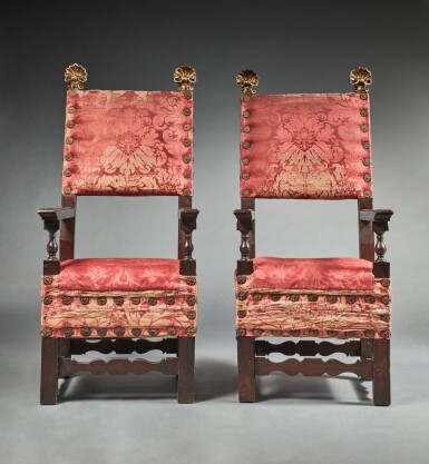 View full screen - View 1 of Lot 121. Pair of Italian baroque parcel-gilt walnut armchairs 17th century and later.