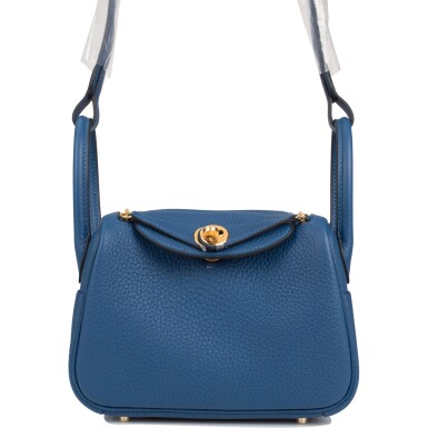 View full screen - View 1 of Lot 9. HERMÈS | DEEP BLUE MINI LINDY OF CLEMENCE LEATHER WITH GOLD HARDWARE.
