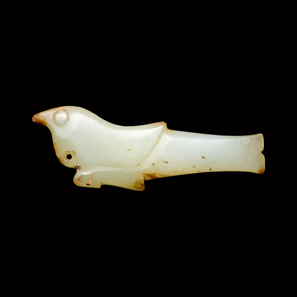 View full screen - View 1 of Lot 44. A white jade 'bird' pendant Late Shang – Western Zhou dynasty | 商晚期至西周 白玉鳥珮飾 .
