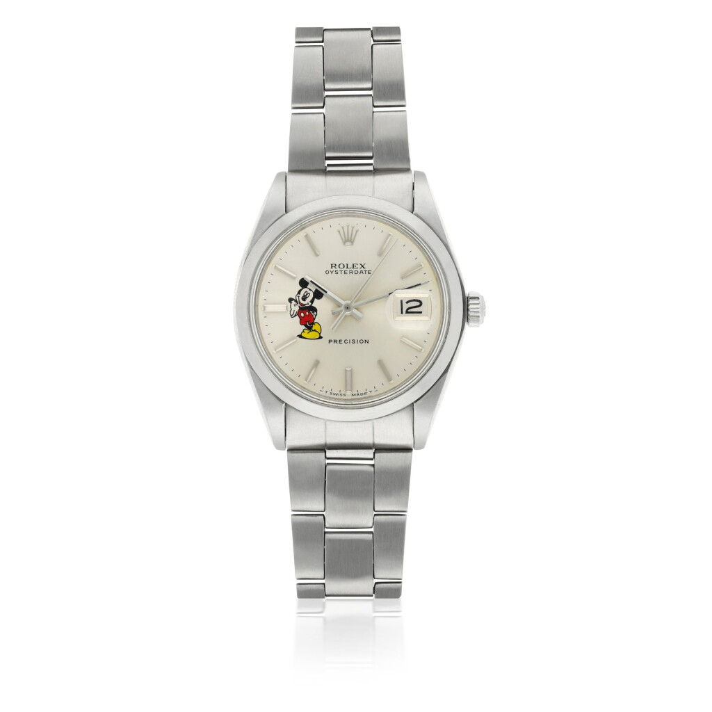 View full screen - View 1 of Lot 171. ROLEX | ROLEX: REF 6694 PRECISION OYSTERDATE 'MICKEY MOUSE', A STAINLESS STEEL WRISTWATCH WITH DATE AND BRACELET CIRCA 1971.