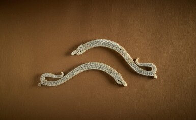 View full screen - View 1 of Lot 114. A pair of jade 'dragon' pendants, Eastern Zhou dynasty, Warring States period .