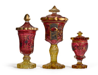 View full screen - View 1 of Lot 137. Three Bohemian cut, stained, silvered and gilt goblets and cover, all circa 1840.
