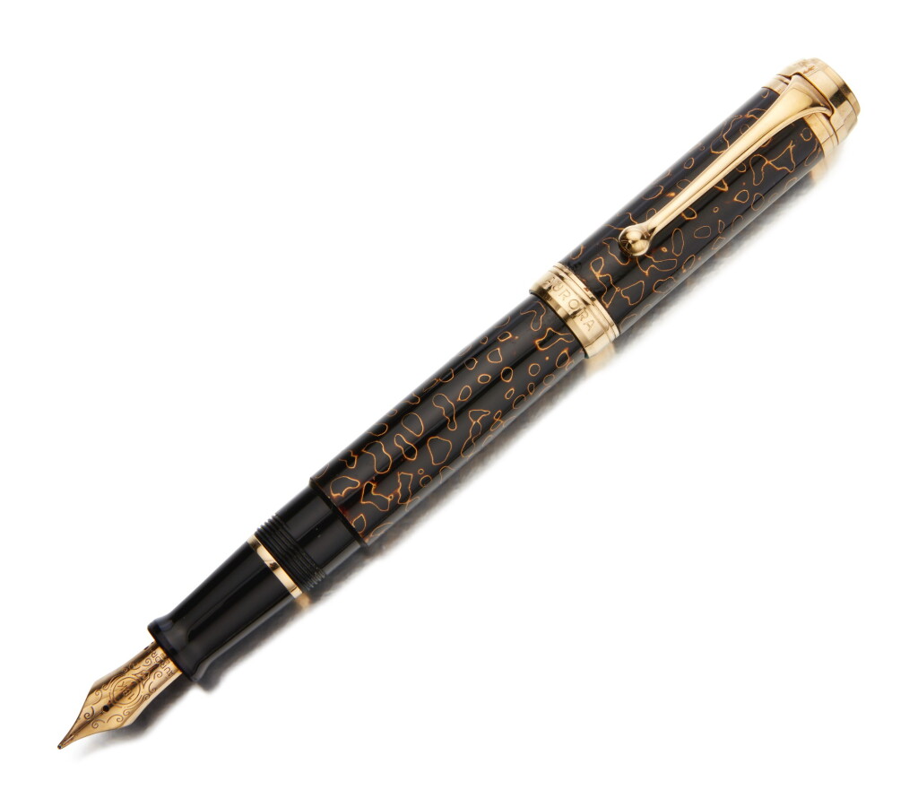 View full screen - View 1 of Lot 17. AURORA | A DARK BROWN LACQUERED PEN WITH GOLD ACCENTS, CIRCA 2005.