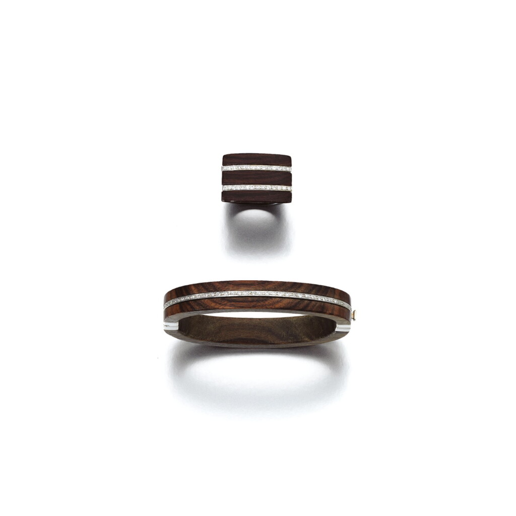 View full screen - View 1 of Lot 132. ROSEWOOD AND DIAMOND BANGLE AND A RING.