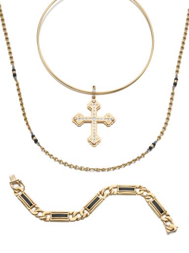 View full screen - View 1 of Lot 867. Collection of gold, onyx and diamond jewels.